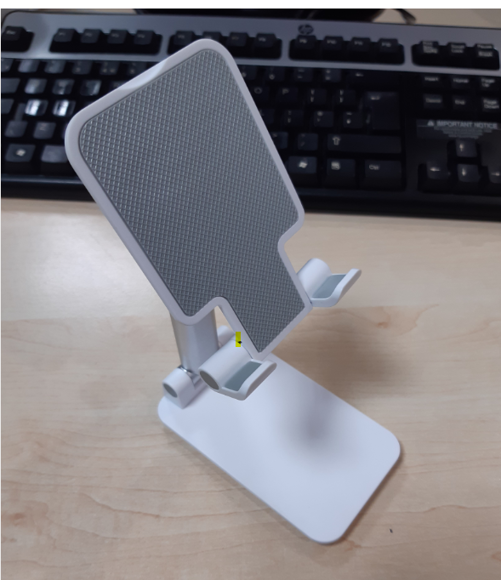 Cell phone store holder for desk